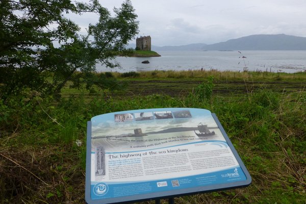 An interpretation board by the boat house