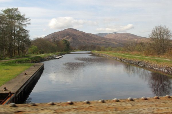Crossing The Caledonian Canal on the old metal swingbridge
