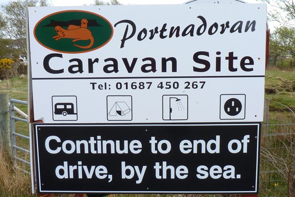 The sign for Portnadoran Caravan Site