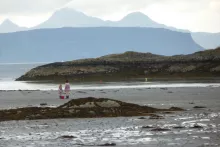 Looking out from Samalaman Beach to Eigg and Rum