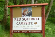 The sign for The Red Squirrel Campsite