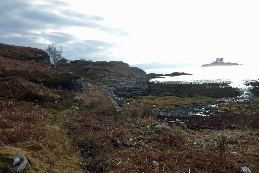 The path continues onto the headland