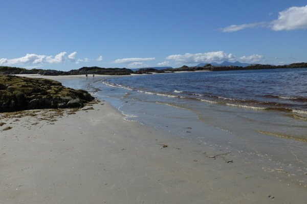 At low tide you can walk around the first headland