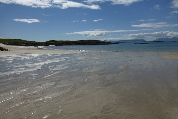 There are several sandy bays along the coast