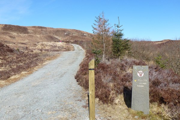 Marker post and path to Cow Hill Summit