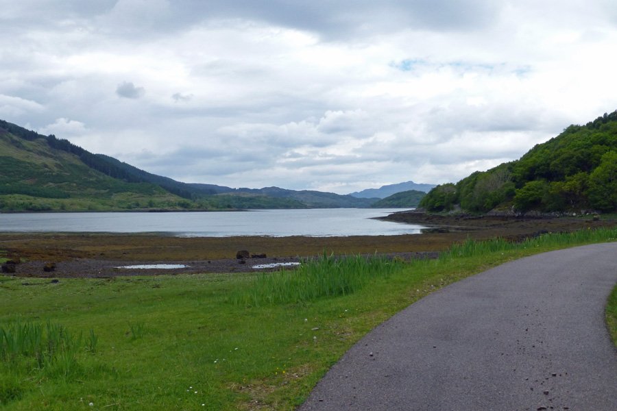 The private road pases close to the shoreline of Loch Teacuis