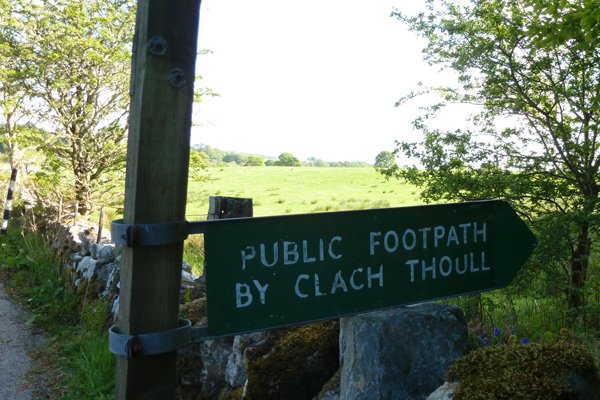 The path meets a minor road here