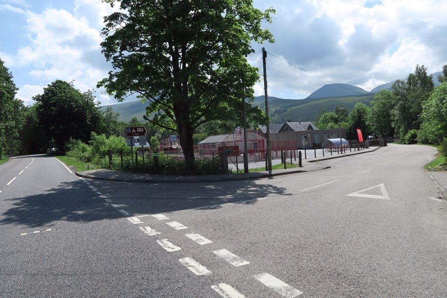 Turn right just before Roy Bridge School
