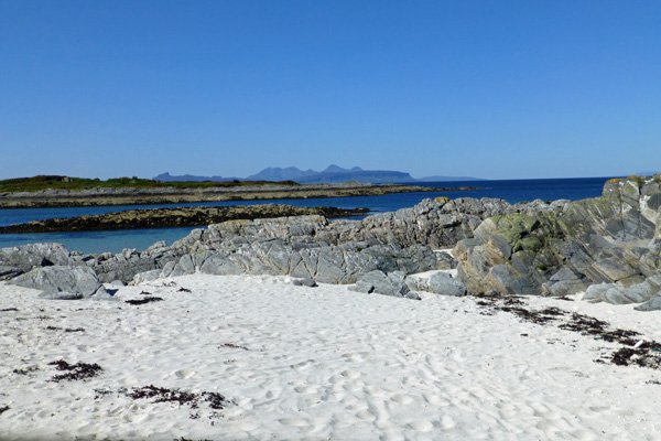 Silver sands, blue seas, blue skies...